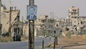 العثور على بشار الأسد بين حطام إحدى المدن المحررة (صورة)